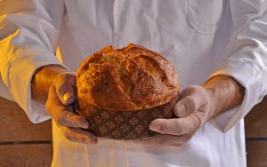 Baker,Holding,Panettone,Bread.
